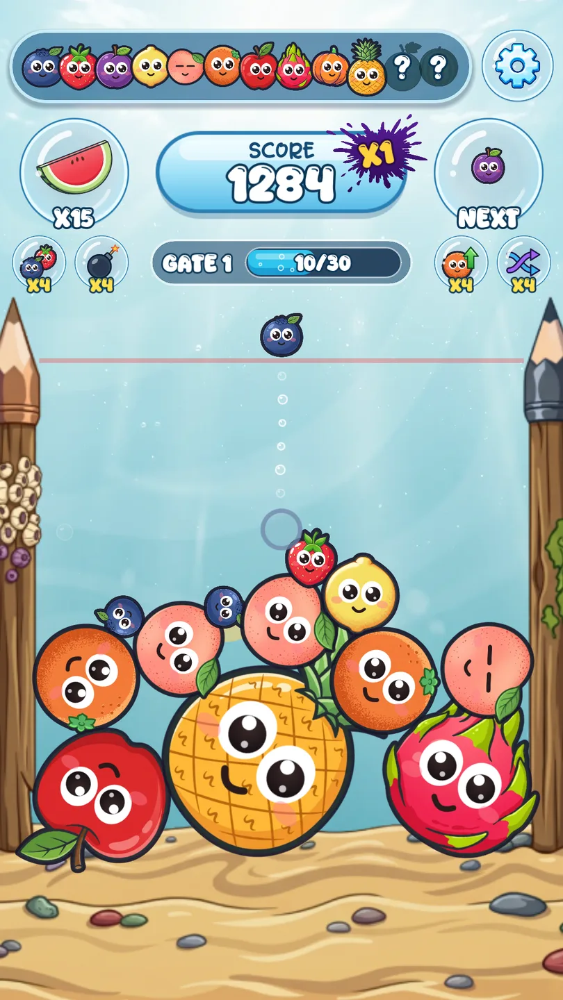 A tank of smiling fruit piled on the seabed, with a blueberry lined up to drop — drop and merge fruit to grow bigger ones